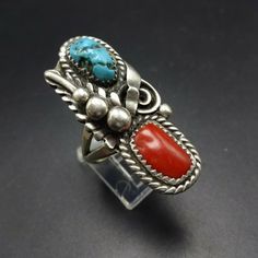 "VINTAGE NAVAJO TURQUOISE and CORAL RING by DAVID K LISTER DESCRIPTION: This ring will be a treasured addition to your collection of fine vintage Native American jewelry. MEASUREMENTS: Ring face measures 1 1/2\" x 5/8\" WEIGHT: 11.7 grams SIGNED: DKL, for David K Lister (Navajo) STERLING: unmarked, verified sterling silver" Southwestern Multi-stone Oval Turquoise Ring, Southwestern Oval Turquoise Multi-stone Ring, Southwestern Gemstone Rings For Collectors, Vintage Turquoise Ring With Inlay, Vintage Turquoise Inlay Ring, Vintage Multi-stone Turquoise Ring Gift, Vintage Oval Turquoise Ring, Southwestern Style Red Turquoise Ring, Vintage Turquoise Multi-stone Rings