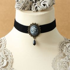 Our Victorian Choker : Timeless Elegance Have you ever dreamed of wearing a jewelry piece that celebrates your femininity while staying true to a timeless style? The Victorian Choker necklace is the answer to your dreams. Don't wait any longer to add this steampunk choker necklace to your jewelry collection. Order today and enjoy fast and free shipping as well as a 100% satisfaction guarantee! More about the choker: Total length 14 inches |36 cm Style: Neo-Gothic Material: velvet, zinc alloy Loo Victorian Choker Necklace, Cameo Choker, Steampunk Choker, Victorian Choker, Victorian Style Jewelry, Black Cameo, Victorian Accessories, Vintage Choker Necklace, Velvet Choker Necklaces