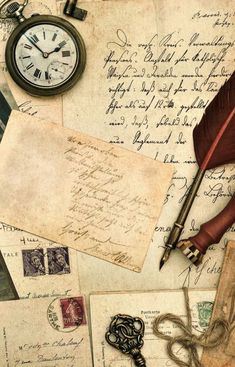 an old letter, quill, pen and pocket watch on top of some letters