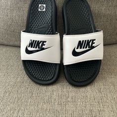 Brand New Never Worn Size S/M Nike Slides Black Slides For Leisure In Spring, Nike Black Slides With Rubber Sole, Black Slides With Rubber Sole, Casual Slides With Round Toe Rubber Sole, Black Low-top Slides With Rubber Sole, Black Non-slip Slides For Leisure, Nike Casual Slides With Cushioned Footbed, Nike Casual Slides For Streetwear, Black Comfortable Nike Slides