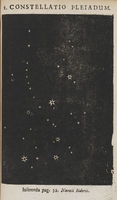 an old book with stars in the sky