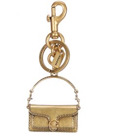 From COACH&#x2C; this bag charm features:Attach it to a favorite bag or set of keys.Plated metalAttached split key ring and dog leash clipApprox. length 2.0"Imported. Gold Logo Charm Bag Charm, Chic Gold Bag With Logo Charm, Gold Bags With Logo Charm, Rectangular Logo Bag Charm, Gold Rectangular Keychain With Key Leash, Metal Keychains With Key Leash For Everyday Use, Gold Keychain Bag Charm For Everyday Use, Gold Bag Charm With Logo For Everyday Use, Gold Bag Charm With Logo