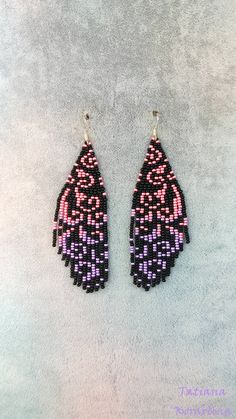 These handmade author's bright pink red earrings are made of high-quality Czech beads and strong synthetic thread.In these unique earrings I use my author's scheme . 100% hand made with love!  Copy without my permission is prohibited  For those who want to buy my copyright scheme for these earrings: https://www.etsy.com/listing/1477217318 Measurements: Length with hook - about 10 cm( 4 inch ),Width -3 cm (1,18 inch) Materials: Silver  plated ear hooks Czech glass beads Tytan Thread Pink Brick Stitch Earrings, Unique Pink Beaded Dangle Earrings, Unique Pink Dangle Beaded Earrings, Pink Dangle Beaded Earrings For Festival, Pink Earrings With Colorful Beads For Gift, Unique Purple Earrings With Dangling Beads, Unique Pink Earrings With Colorful Beads, Handmade Purple Beaded Earrings, Pink Beaded Drop Earrings For Festivals