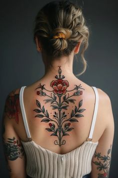 a woman with tattoos on her back