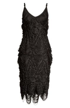 Emulating jacquard designs, intricately looped fringe composed of silk cord channels the Roaring Twenties on this cocktail dress that was the star of the label's fall '24 runway show. Slips on over head V-neck Lined 70% silk, 22% viscose, 4% polyester, 3% polyamide, 1% elastane Dry clean Made in Italy Designer Clothing Elegant V-neck Dress With Fringe For Cocktail, Knee-length Fringe Mini Dress For Cocktail, Elegant Knee-length Fringe Mini Dress, Cocktail V-neck Mini Dress With Fringe, Party Mini Dress With Fringe And V-neck, Halterneck Mini Dress, Fringe Mini Dress, V Neck Cocktail Dress, Chiffon Midi Dress