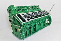 the engine block is green and has four cylinders