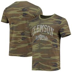 Show off your Clemson Tigers loyalty in sustainable style with this Arch Logo T-shirt from Alternative Apparel. It's made of ultra-soft tri-blend fabric that features eco-friendly materials to ensure supporting the Clemson Tigers has never felt better. The camo design and team details make this tee a great addition to your collection.Show off your Clemson Tigers loyalty in sustainable style with this Arch Logo T-shirt from Alternative Apparel. It's made of ultra-soft tri-blend fabric that featur Maryland Terrapins, Arch Logo, Alternative Apparel, West Virginia Mountaineer, Camo Designs, Florida State Seminoles, Alabama Crimson, Alternative Outfits, Logo T Shirt