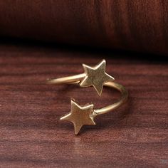 Gold Star ring, Midi star ring, Vintage ring, Celestial Ring, Modern ring, Adjustable ring, Gift for her, Delicate ring, Mothers day gift Material-Brass 1. Please share your numbers (in personalization box ) as required for shipping address details, and it'll help us to contact you easily. And don't worry about the privacy, we'll keep it safe with us, So try to cooperate with us. :) 2.Customers' satisfaction is our biggest priority, please contact us with any questions/queries for future or existing orders, and we will do our best to make sure you are happy with your order. 3.Please make sure to add the correct address during checkout. You can return your purchased item within 15 days after successful delivery. We offer a 100% "Money Back Guarantee" if you are not satisfied with your purch Christmas Ring, Celestial Ring, Chunky Rings, Ring Minimalist, Modern Ring, Star Ring, Brass Ring, Gold Star, Delicate Rings