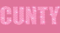 the word country is made up of sparkling pink letters and sparkles on a pink background