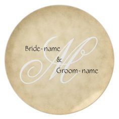 a plate with the words bride - name and groom - name on it, in white ink