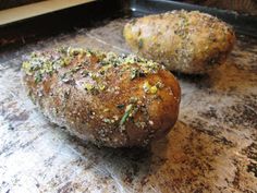 two pieces of bread sitting on top of a counter