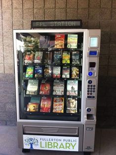 a vending machine with many books in it