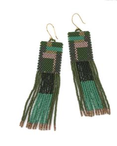 Cutest beaded earrings! Elegant Green Chandelier Earrings With Colorful Beads, Elegant Green Beaded Chandelier Earrings, Elegant Adjustable Beaded Earrings With Colorful Beads, Elegant Multicolor Hoop Earrings With Dangling Beads, Elegant Adjustable Colorful Beaded Earrings, Unique Green Long Drop Earrings, Elegant Multicolor Beaded Hoop Earrings, Handmade Elegant Long Drop Beaded Earrings, Unique Long Drop Beaded Earrings As A Gift