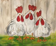 three roosters are standing in front of a fence with grass and flowers on it