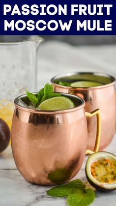 two copper mugs filled with passion fruit moscow mule