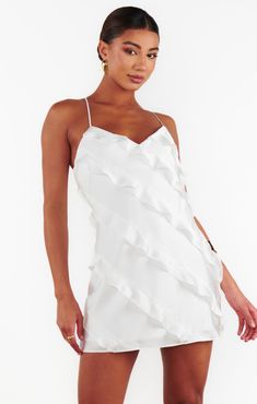 This mini slip dress is the perfect mix of elegance and playfulness. The luxurious satin finish adds a sophisticated touch, while the ruffle detailing enhances its romantic allure, making it ideal for any bridal event. Whether you're celebrating your bachelorette, bridal shower, or engagement party, this dress ensures all eyes will be on you as you’re in the spotlight! Hoco Inspo, Mumu Wedding, Classy Fits, Bridal Event, Mini Slip, Ruffle Mini Dress, In The Spotlight, Mini Slip Dress, All Eyes