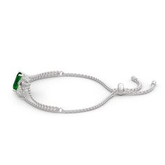 Shimmering with your affection, this bracelet shoots straight to her heart. Crafted in sterling silver, it features a glittering emerald cut stone to bring out it's beauty and sparkle. Additional stones form leaf-shaped design to add more elegance to this bracelet. She'll admire the nature-inspired details of this lovely leaf bracelet.Carat Weight: 2.76 ctStone Size: 8*10 mmNumber of Stones: 1 Stone Shape: RadiantStone Color: Emerald GreenCarat Weight: 0.65 ctStone Size: 1.2,1.1,1,0.8,1.8,1.7,1. Luxury Silver Tennis Bracelet With Emeralds, Elegant Silver Tennis Bracelet With Emeralds, Elegant Silver Emerald Tennis Bracelet, Emerald White Gold Bracelet, Emerald Cut Diamond Bracelet In White Gold As Gift, Silver Emerald Bracelets In Fine Jewelry Style, Silver Emerald Bracelet Fine Jewelry, Emerald Cut Tennis Bracelet As Gift, Sparkling Sterling Silver Bracelet