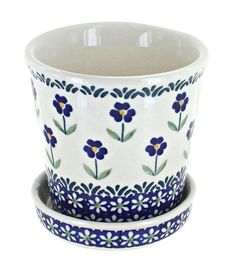 Polish artists have been celebrating the rich tradition and culture of pottery dating back to the 16th century. Each piece has been handcrafted, hand decorated, and high fired for beautiful, heirloom quality pieces. Designed for everyday use, they are dishwasher, microwave, and oven safe.","Petite flowerpots are double glazed for years of indoor and outdoor use. Great for starting herbs or small houseplants. Drainage hole and tray prevent plants from being overwatered while keeping your space cl Ivy Flower, Blue Rose Polish Pottery, Periwinkle Flowers, Painted Pots Diy, Ceramic Flower Pots, Planter Stand, Blue Daisy, Violet Flower, Polish Pottery