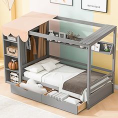 a bunk bed with two drawers underneath it