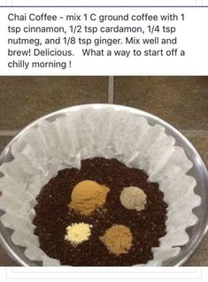 a cupcake in a paper plate on the ground with coffee grounds and powdered sugar