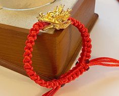 Dragon Bracelet/ Dragon/ Gold Dragon /lucky Bracelet/ Red - Etsy Gold Spiritual Braided Bracelet For Good Luck, Gold Braided Bracelet For Good Luck, Traditional Red Wristband As Gift, Traditional Red Wristband Gift, Traditional Red Wristband For Gift, Adjustable Knot Bracelet, Red Thread Bracelet, Mythical Dragons, Thread Bracelet