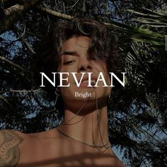 a man with tattoos standing in front of a tree and the words nevian on it