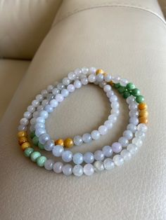 🌈 Jadeite Beaded (7.0mm) Necklace Bracelet, 188 beads 🌷 Untreated Natural Jadeite/ Grade A Jade 🌷 Jade from Myanmar/ Burma 🌷 100% handmade carving 🌷 Bead size : 7.0 mm 🌷 Number of Beads : 188 🌷 Length : ~74cm 🌷 Color : Icy White, Light Purple, Green & Brown 🌷 Free shipping from Hong Kong with tracking number provided 🌷 Take approximately 7-28 days to arrive worldwide ❤️ In Chinese Culture: Young people wear jade pendant will have a prosperous life, attracts good luck and friendship Healing Single Strand Round Bead Gemstones, Spiritual Round Beads Single Strand Gemstones, Spiritual Single Strand Bracelet With Round Beads, 108 Bead, Jade Bracelet, 28 Days, Bead Bracelets, Stretchy Bracelets, Jade Stone