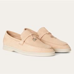 Loro Piana Summer Charms Walk Suede Loafers In Pink Sand Suede Size 36 Exceptionally Comfortable, Sporty Loafers Made From Soft Suede. They Are Enhanced With Non-Marking Rubber Soles A Common Feature Of All Loro Piana Sportswear Shoes. The Front Saddles Are Embellished With Mini My Charms. Perfect For Summers Spent Sailing, At The Beach Or In The City. Minimalist Luxury At Its Finest. Excellent Preloved Condition *Minor Wear On Sole Bottoms, Very Faint Marks On The Medial Side Seen Last Photo Lo Elegant Suede Slip-ons With Flat Heel, Elegant Calf Leather Slip-ons With Suede Lining, Elegant Calf Leather Flat Slip-ons, Luxury Leather Slip-on Shoes For Spring, Luxury Flat Loafers For Spring, Elegant Flat Calf Leather Slip-ons, Luxury Flat Heel Moccasins For Galas, Elegant Beige Slip-ons With Leather Sole, Luxury Leather Shoes For Spring Galas