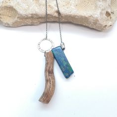 Azurite Necklace Natural Stone Pendant Throat Chakra Crystal Necklace Healing jewelry Vegan Necklace Wooden Necklace This boho piece of jewelry is really light to wear and eco-friendly. All driftwood pieces are collected from the beach and are perfect for people who love nature. ➽DESCRIPTION: The driftwood and gemstone are attached to a sterling silver black rhodium plated chain with a spring-ring closure which is decorated with hammered sterling silver oxidized disc. ➽VARIATIONS Azurite Green G Earthy Handmade Blue Necklace, Blue Handmade Rustic Necklace, Rustic Blue Handmade Necklace, Rustic Handmade Blue Necklace, Blue Rustic Necklace For Gifts, Rustic Blue Necklace For Gifts, Rustic Blue Necklace For Gift, Rustic Blue Jewelry With Natural Stones, Driftwood Necklace