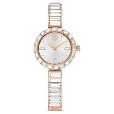 Elegance is amplified with crystals in this beautiful jewelry-inspired timepiece. The 25mm stainless steel design has a rose gold-tone finish and is encircled by a bezel with 20 baguette-cut clear crystals, while a single crystal is set within the crown. Baguette-cut crystals also highlight three index markers on the light gray dial, which also features a swan logo at 12 o’clock. Around the wrist, the bangle-style bracelet is adorned with 16 baguette-cut crystals and is fully adjustable for a co Swarovski Watch, Rose Watch, Swan Logo, Stackable Ring Sets, Bracelet Rose Gold, Pink Watch, Bangle Watches, Bangles Style, Clear Crystals