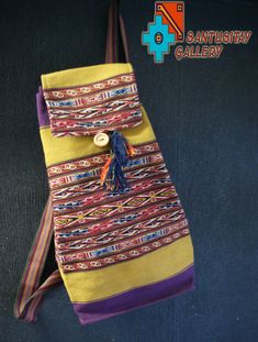 An amazing bagpack has been made on the loom with perfection and attention to details. This is tribal pattern of Sacred Valley communities in Peru and is part of Andean tradition. The alpaca and sheep wool used to create that backpack was natural dyed using plants and insects grows in the valley. Inside backpack finished with black fabrick and have small zipped pocket. Outside fastened with wooden button and pulled with a string. Dimensions: height: 42 cm/ 16,5 inch width: 35 cm /13,5 inch base: Bohemian Rectangular Backpack For Festivals, Bohemian Handmade Backpack For Travel, Bohemian Woven Backpack For Everyday Use, Traditional Handmade Rectangular Backpack, Bohemian Backpack For Festivals, Bohemian Handmade Travel Backpack, Bohemian Woven Backpack For Daily Use, Bohemian Multicolor Backpack For Festival, Bohemian Multicolor Backpack For Daily Use