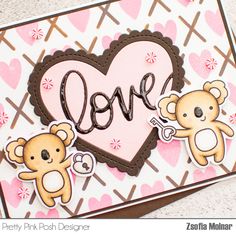 a close up of a card with two teddy bears and the word love on it