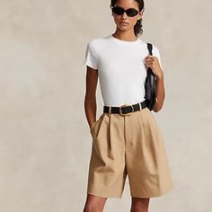 Belt Not Included>Dressy Causal Tan Shorts High Waisted Come Right Above The Knee. Made With A Blend Of Italian Cotton Twill And Wool, These Pleated-Front Shorts Are Designed With A Relaxed Silhouette And An Elongated Inseam. Mid-Rise. Relaxed Fit. Intended To Hit Above The Knee. Us Size 8 Has A 12" Rise And A 32" Leg Opening. All Sizes Have An 8.5" Inseam. Belt Loops. Zip Fly With A Buttoned Closure. Side On-Seam Pockets. Two Back Buttoned Welt Pockets. Pleated Front Waist. Back Waist Darts. 70 Classic Fitted Shorts For Day Out, Classic Fitted Shorts For A Day Out, Belted Shorts Outfit, Dressy Shorts Outfits Women, Twill Outfit, Shorts Business Casual, Ralph Lauren Shorts Women, Dressy Shorts Outfits, Structured Shorts