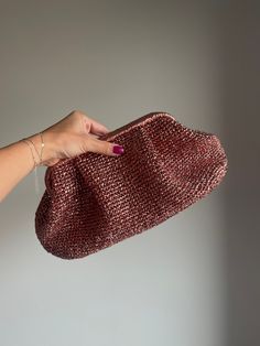 I knitted this eye-catching crochet bag with metallic raffia yarn. Shiny Yarn Evening Bags are a unique piece that you can always use. -It is quite wide inside. You can carry all your belongings. -It is lined. -25cm hidden scholarship -Width 30cm, height 15cm -Weight 250gr. Gold Crochet Evening Bag, Elegant Handmade Gold Crochet Bag, Elegant Gold Crochet Clutch Bag, Gold Woven Crochet Pouch Bag, Luxury Chic Crochet Clutch Bag, Raffia Bag, Pouch Bag, Clutch Purse, Clutch Handbag