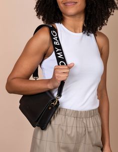 Canvas O My Bag Logo Strap in black. Model image Bag Logo, Sustainable Leather, Best Handbags, Webbing Strap, Black And White Canvas, Bags Logo, Aging Beautifully, My Bag, Bum Bag