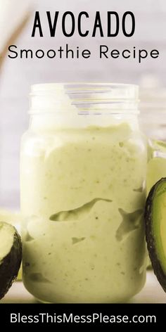 avocado smoothie recipe in a mason jar with sliced avocados on the side