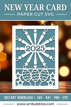 the new year card paper cut svg is displayed on a table with lights in the background