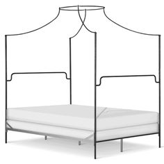 an iron bed frame with white sheets and pillows on it, viewed from the side