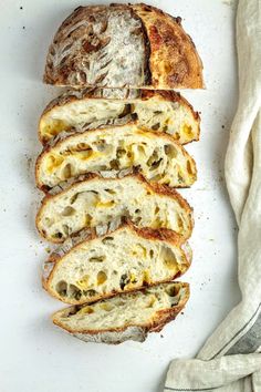 slices of bread sitting on top of a white counter