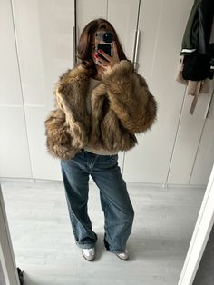 2000 Fur Coat, Fur Hat Winter Outfit, Winter Jacket Inspo 2024, Black Shearling Coat Outfit, Fur Coat With Jeans, Styling A Fur Coat, Fur Bomberjack Outfit, How To Style A Fur Coat, Brown Fur Coat Outfit Street Style