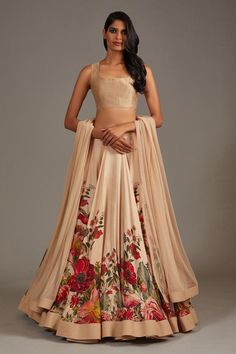 Beige flared lehenga with rafflesia bloom print. Paired with sleeveless square neckline blouse and dupatta.
Components: 3
Pattern: Print 
Type Of Work: Rafflesia Bloom
Neckline: Square 
Sleeve Type: Sleeveless
Fabric: Modal and Chanderi, Lining: Silk
Color: Beige
Other Details: 
Note: The cancan skirt worn by the model is not for sale
Occasion: Bride, Destination Wedding - Aza Fashions Bandhani Lehenga, Editors Note, Lehenga Pattern, Simple Lehenga, Printed Lehenga, Raw Silk Lehenga, Rohit Bal, Lehenga Blouse, Wedding Lehenga