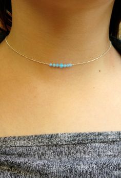 "This Tiny & Dainty Choker necklace is composed of a 3mm & 4mm Blue Opal beads on a delicate Sterling silver beaded chain. Great for layering with other delicate necklace or minimalist wear. 100% Sterling Silver . Length: - All Pieces will have a 1\" extension chain for best adjustment. - In order to select the size/length, it's best to measure your neck: Use a flexible ribbon, wrap it around your neck exactly where you want your choker to sit, and compare the length on a measuring tape. Cheap Handmade Choker With Round Beads, Minimalist Blue Choker With Round Beads, Minimalist Blue Round Beads Choker, Silver Beads Choker Necklace As A Gift, Dainty Choker With Tiny Round Beads, Silver Beaded Choker As A Gift, Silver Beads Choker Necklace For Gift, Minimalist Single Strand Choker, Dainty Adjustable Choker With Spacer Beads