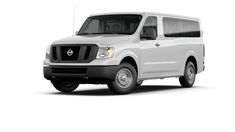 a white nissan commercial van is shown in this studio photo from the front view with no background