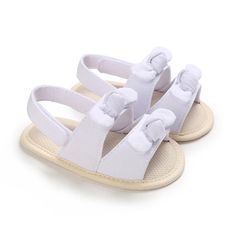 Step into the world of luxury with our exquisite Newborn Girls Summer Soft Sole Non-Slip First Walker Sandals. These fashion-forward sandals feature a shallow design and secure hook & loop closure, perfect for your baby girl's first steps. The soft cotton and PU upper provide both comfort and style, making them a must-have for any fashion-conscious parent. Available in a variety of solid colors, these shoes are suitable for babies aged 0-18 months. Elevate your little one's wardrobe and choose t White Adjustable Non-slip Sandals, Spring Non-slip Flat Slingback Sandals, Spring Vacation Non-slip Slingback Sandals, Non-slip Slingback Sandals For Spring Vacation, Flat Non-slip Slingback Sandals For Spring, Spring Vacation Slingback Sandals With Non-slip Soles, Non-slip Adjustable Open Toe Sandals, Synthetic Open Toe Sandals With Soft Sole, Adjustable Non-slip Open Toe Sandals