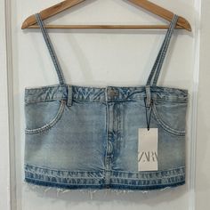 Nwt Zara Women's Light Wash Denim Jean Crop Top, Spaghetti Strap, Size Medium -Brand New With Tags -Fun, Edgy Crop Top -Wear It By It Self With Shorts, Skirts, Or Pants Or On Top Of A White Button Up -2 Front (Real) Pockets -Button & Zip Closure -Raw & Distressed Hem -Color: Light Wash -Non-Adjustable Straps -Material: 100% Cotton -Measurements: Armpit To Armpit 16 3/4 Inch, Length (Armpit To Hem) 9.5 Inch The Miscellaneous Store: Item # A(8) 0009 Spring Jeans With Adjustable Straps, Medium Wash Sleeveless Crop Top For Summer, Medium Wash Crop Top For Summer, Fitted Denim Tops With Adjustable Straps, Casual Spring Jeans With Adjustable Straps, Casual Jeans With Adjustable Straps For Spring, Spring Denim Blue Tank Top, Denim Blue Cropped Denim Tank Top, Denim Blue Cropped Tank Top