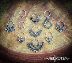 Hand-crafted 9.25 sterling silver, wear it in your septum, side nostril, or wear it as an earring. Please note all nose jewelry is non-refundable. ▪ 𝐃𝐈𝐌𝐄𝐍𝐒𝐈𝐎𝐍𝐒 ▪ *12 mm x 10 mm *18 Gauge *Sterling Silver 9.25 *Sold as a single piece *Please note all nose jewelry is non-refundable. ▪ 𝐏𝐀𝐂𝐊𝐀𝐆𝐄 𝐈𝐍𝐂𝐋𝐔𝐃𝐄𝐒 ▪ * One nose jewelry, as pictured. ▪ 𝐉𝐄𝐖𝐄𝐋𝐑𝐘 ▪ * https://www.etsy.com/shop/vedora ▪ 𝐃𝐈𝐒𝐂𝐎𝐔𝐍𝐓 𝐂𝐎𝐃𝐄𝐒 𝐀𝐍𝐃 𝐍𝐄𝐖 𝐃𝐄𝐒𝐈𝐆𝐍 𝐑𝐄𝐋𝐄𝐀𝐒𝐄𝐒 ▪ * https:/ Nose Peircing, Silver Septum Ring, Nose Ring Septum, Sterling Silver Nose Rings, Septum Rings, Indian Nose Ring, Silver Nose Ring, Septum Jewelry, Nose Jewelry