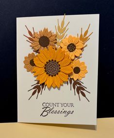 a card with sunflowers on it and the words count your blessing