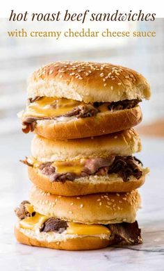 three cheeseburgers stacked on top of each other with the words, hot roast beef sandwiches with creamy cheddar cheese sauce