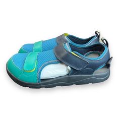 Introducing The Brand New Teva Kids Hurricane Seekado Water Sandal Shoe In Gray/Green! This Shoe Is Perfect For Casual Wear And Comes In A Uk Size 3, Us Size 4, And Eu Size 36. The Shoe Shaft Style Is Low Top With A Hook & Loop Closure For Easy Wear And Removal. This Unisex Shoe Features A Microfiber Upper Material With A Textile Lining Material, And A Flat Heel Height Of Under 1 Inch. The Outsole Material Is Made Of Eva + Rubber, Making It Waterproof And Perfect For Water Activities. The Shoe A Playful Outdoor Sandals For Summer, Adjustable Green Sport Sandals For The Beach, Playful Synthetic Sandals For Outdoor, Casual Sport Sandals With Adjustable Fit For Beach, Casual Beach Sport Sandals With Adjustable Fit, Adjustable Fit Casual Beach Sport Sandals, Casual Adjustable Fit Sport Sandals For Beach, Playful Outdoor Synthetic Sandals, Summer Outdoor Sport Sandals Non-slip