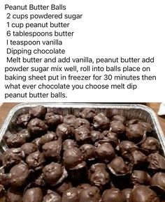 chocolate covered peanut butter balls in a baking pan on a wooden table with instructions for how to make them